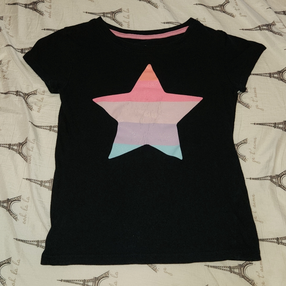 Black T with rainbow star (cracked from wear) Circo